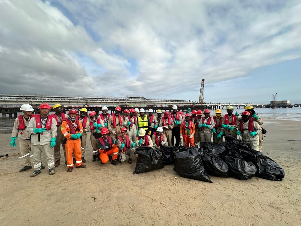 Rotary Club of Bonny Island volunteers after a beach cleaning exercise